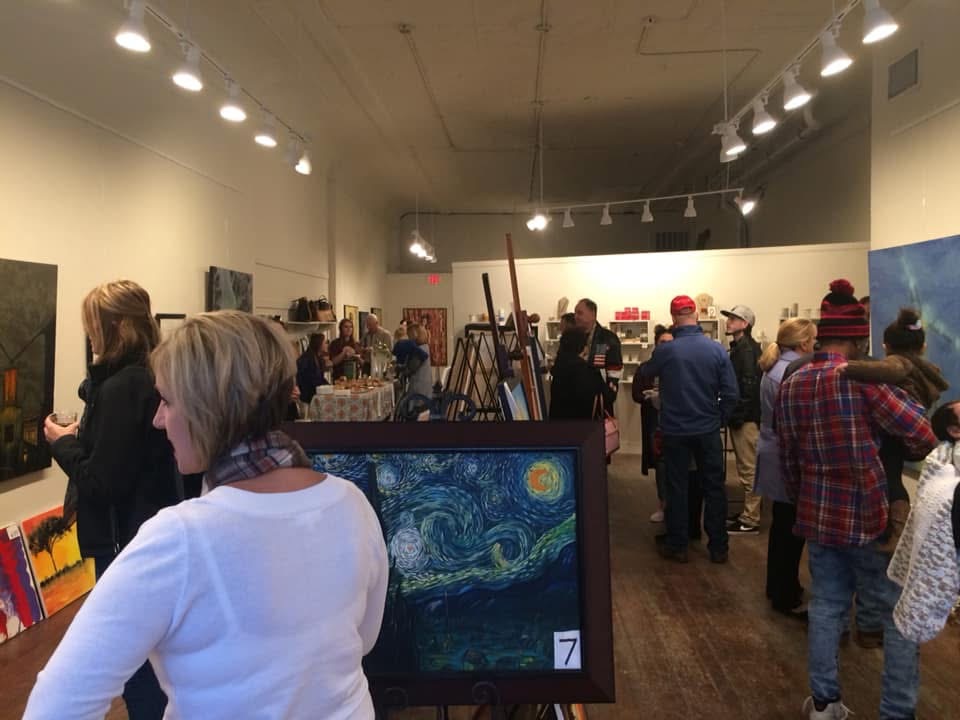 Student artwork displayed at Atchison After School Club Art Exhibition